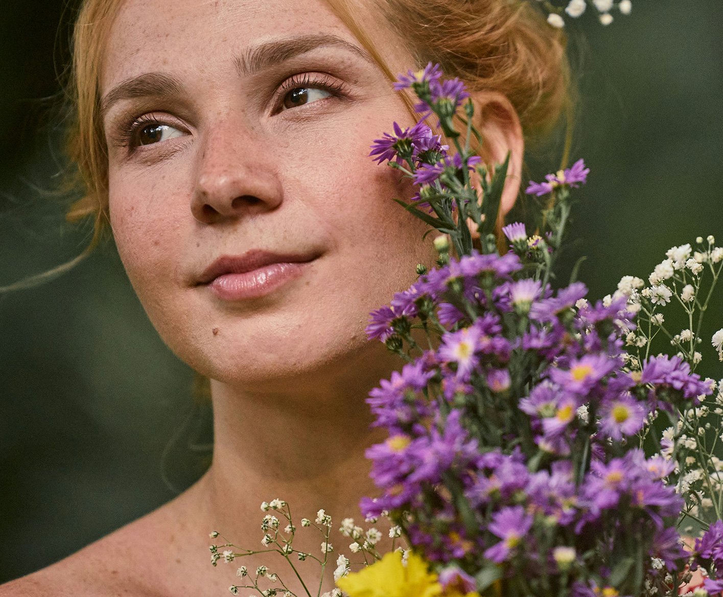 A person sitting quietly in soft natural light
