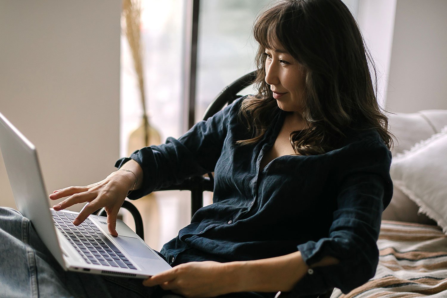 A woman on a video therapy session at home
